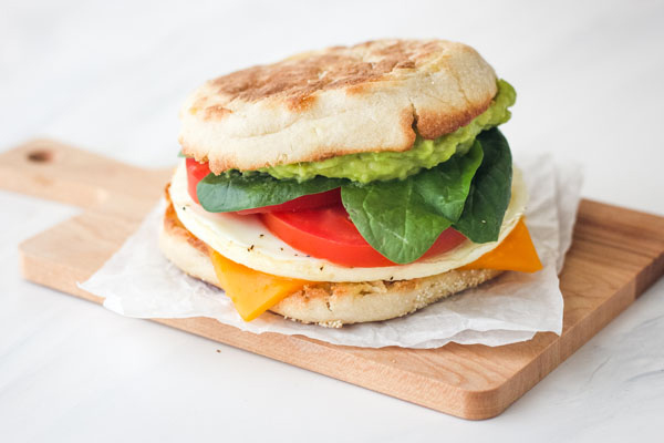 Breakfast bread on a small wooden cutting board.