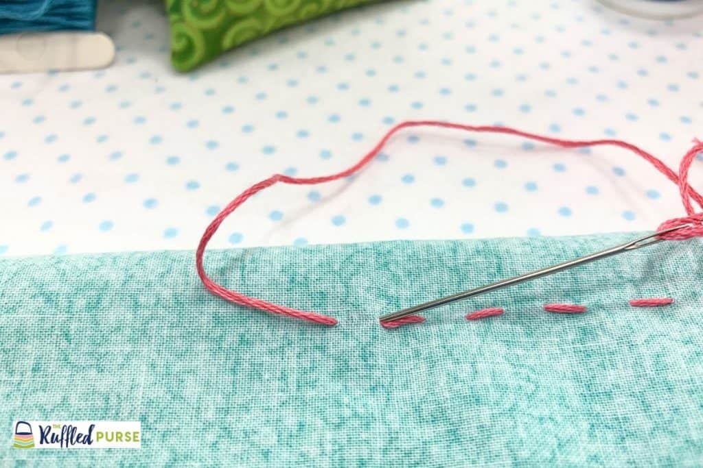 Insert needle from wrong side of the fabric.