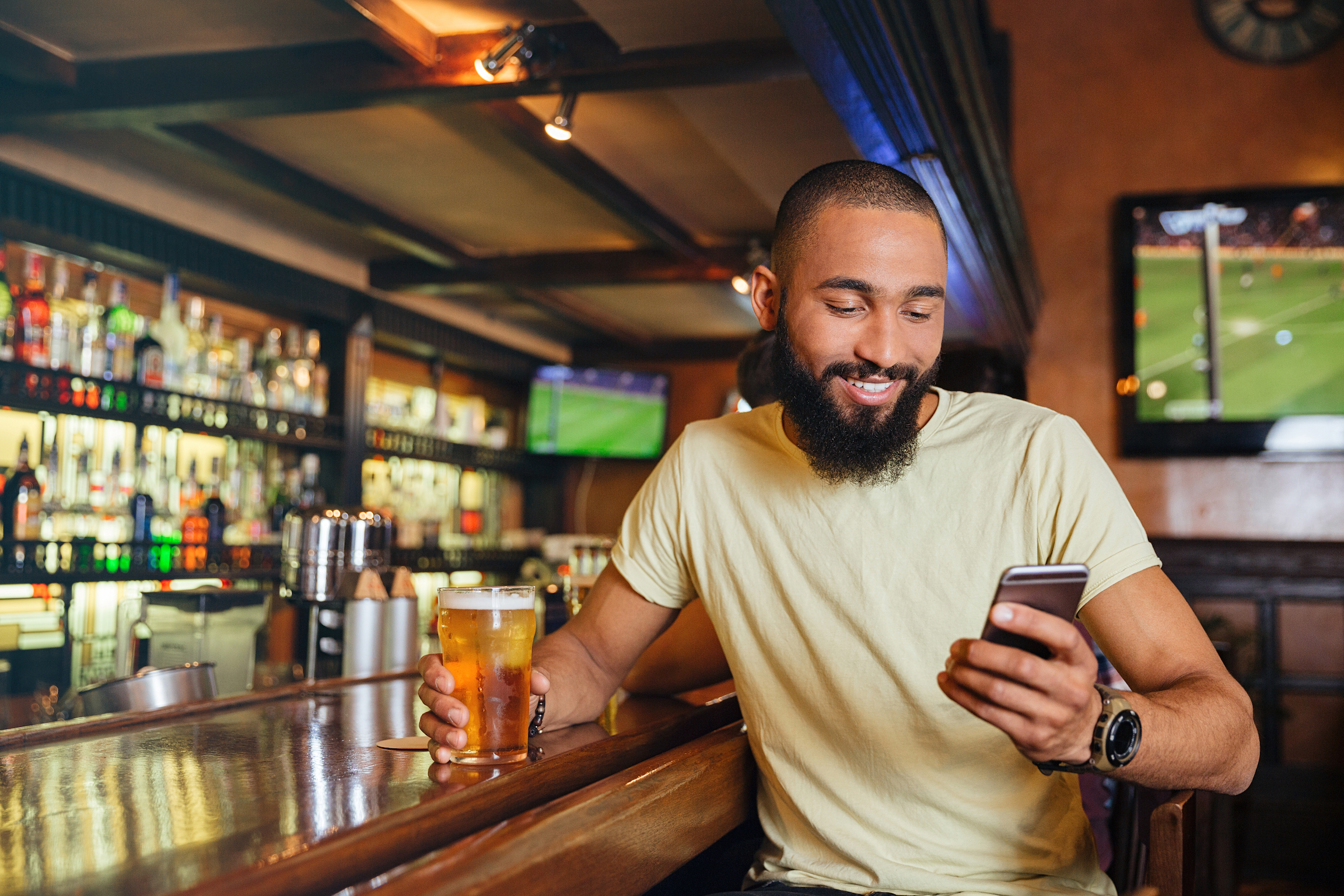 Attractive man in the bar smiling
