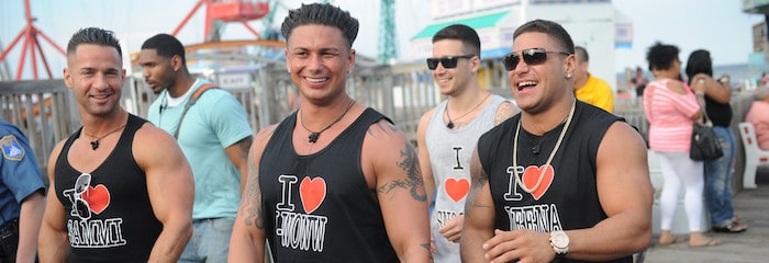 Cast members of the jersey shore, who are very tan.