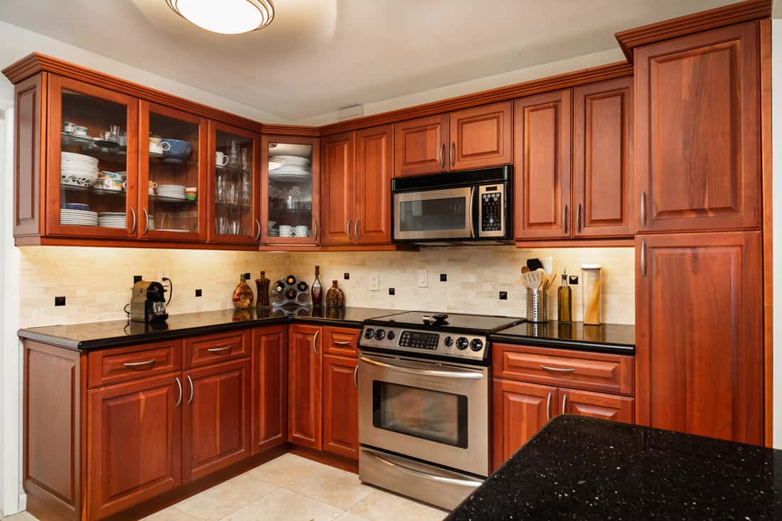 What color cabinets with black granite countertops?