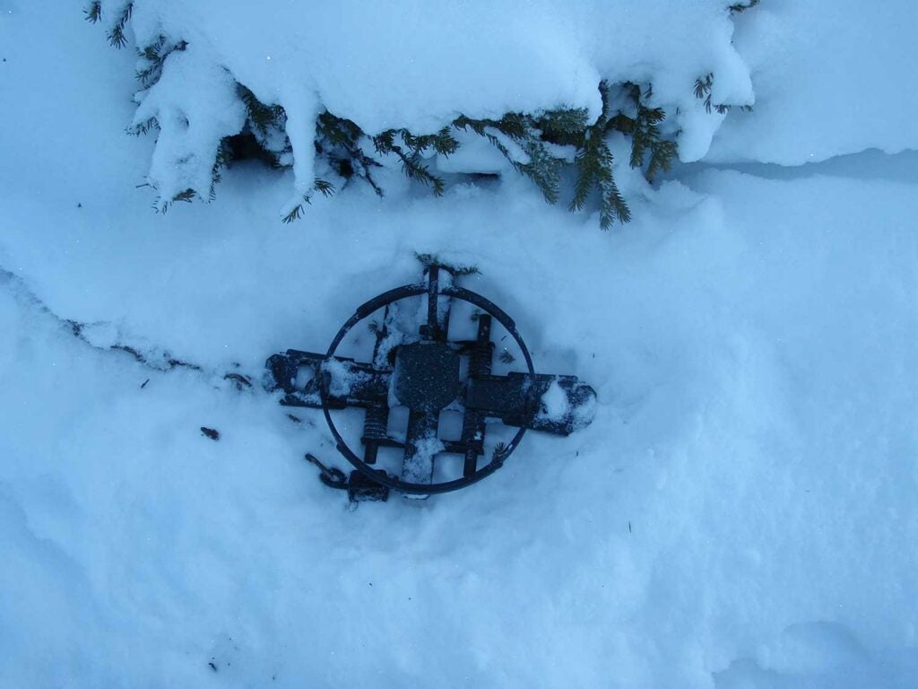 A foxhole, before it was covered with snow.