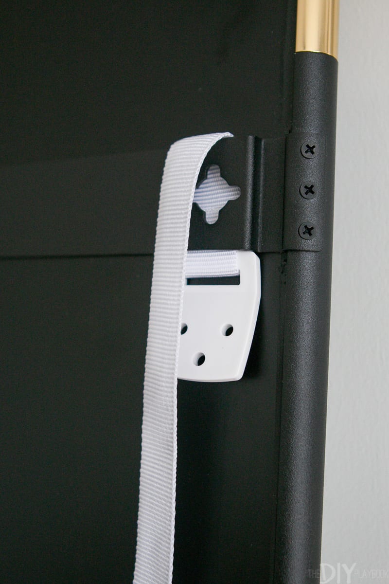 Place furniture straps on wall studs to keep your home secure.