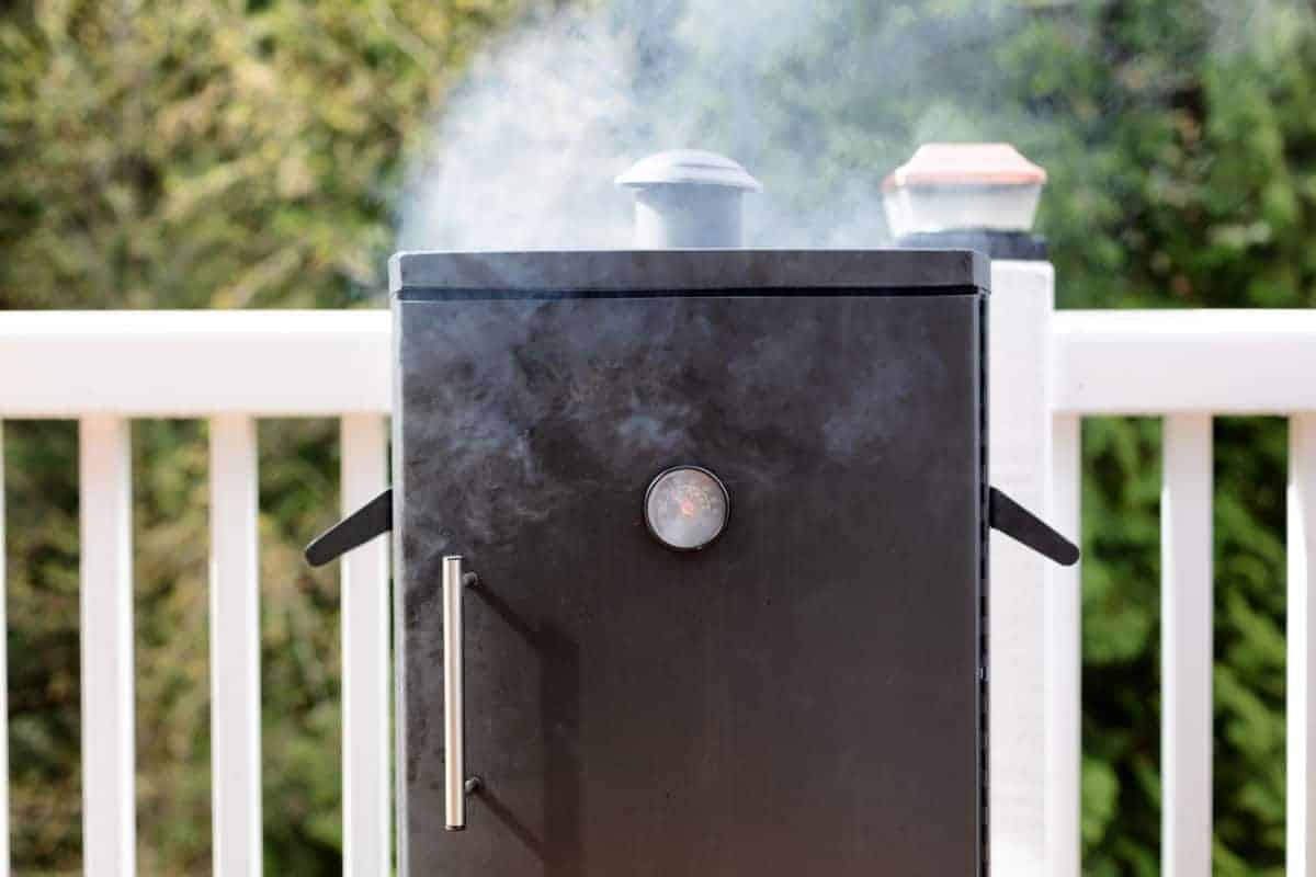 Thick electric smoke machine, with smoke coming out of the top