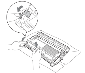 Remove the Brother TN-450 toner cartridge from the drum unit