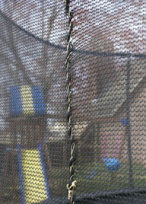 Sewing hole trampoline mesh