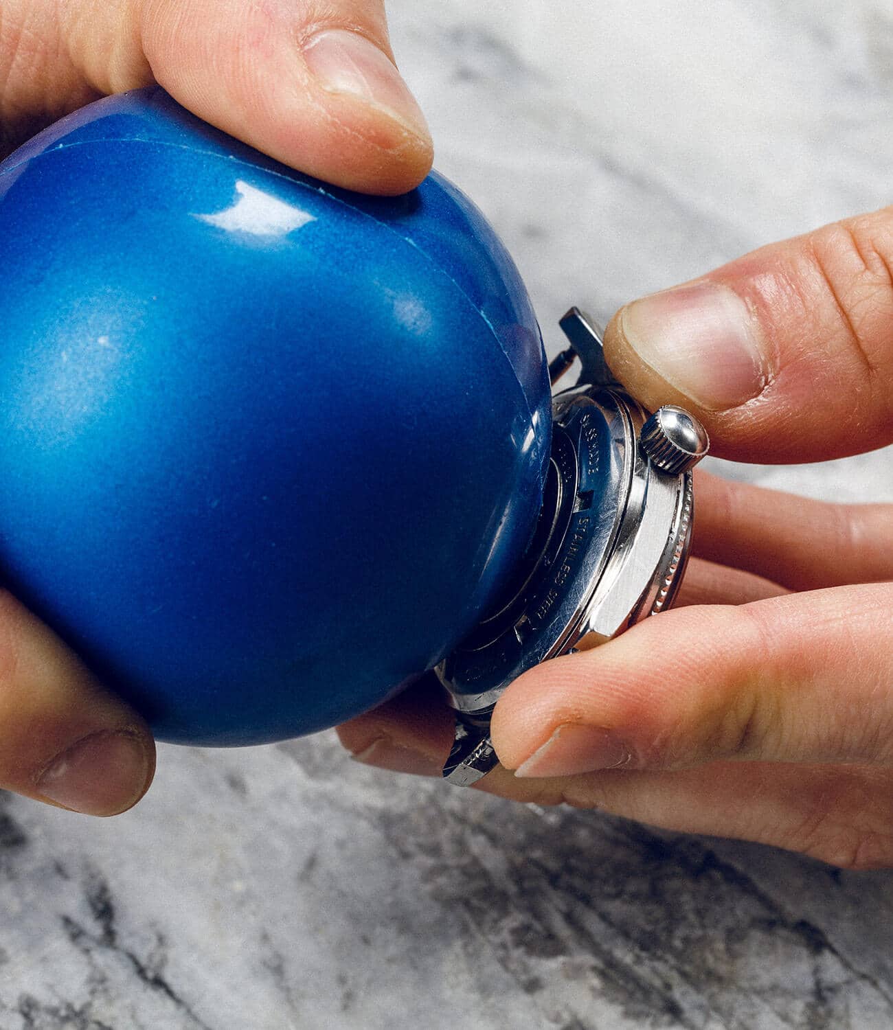 Using a rubber ball on a screw-down watch