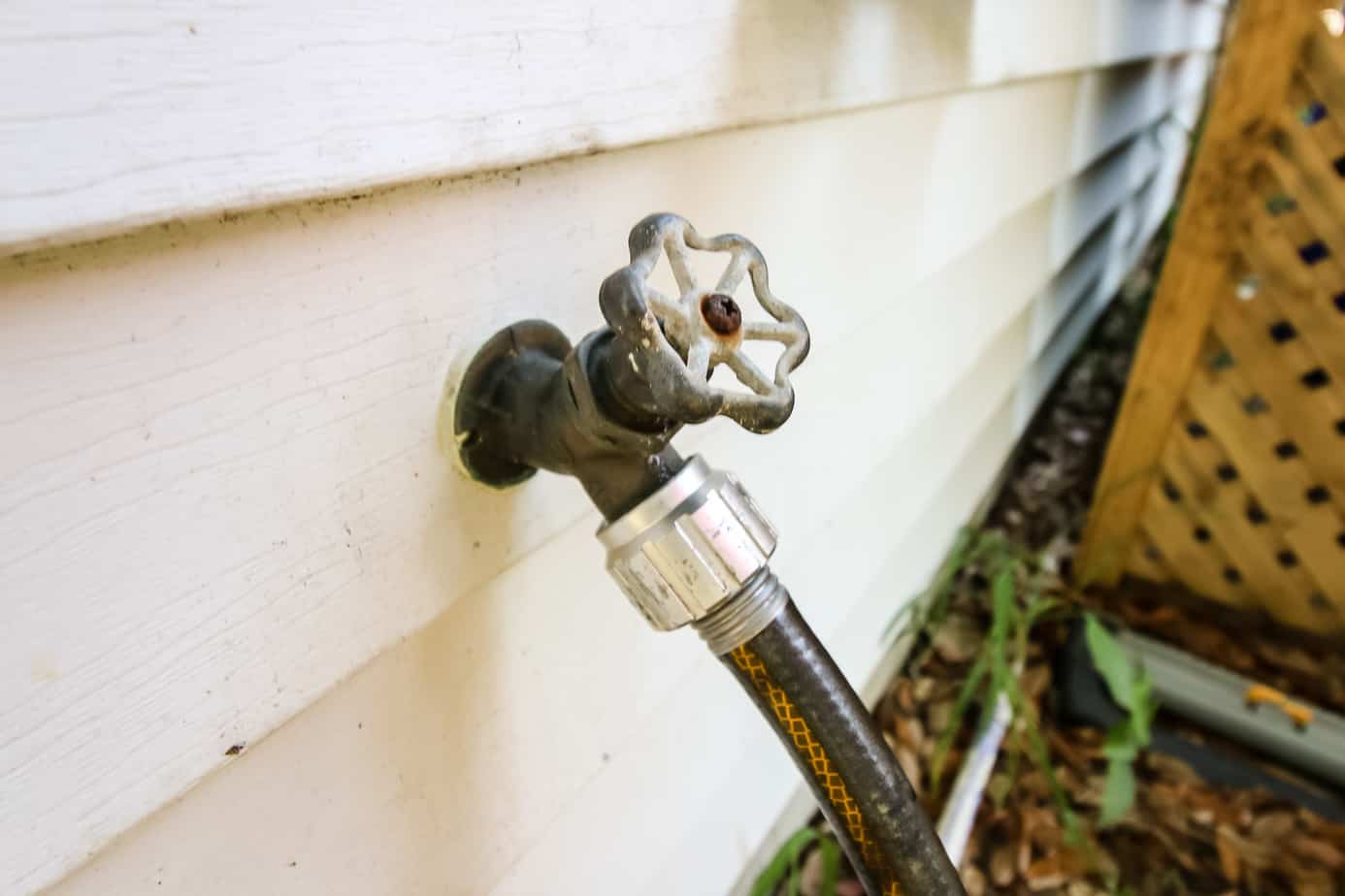 How to remove a stuck hose on an outdoor faucet - Charleston Crafted