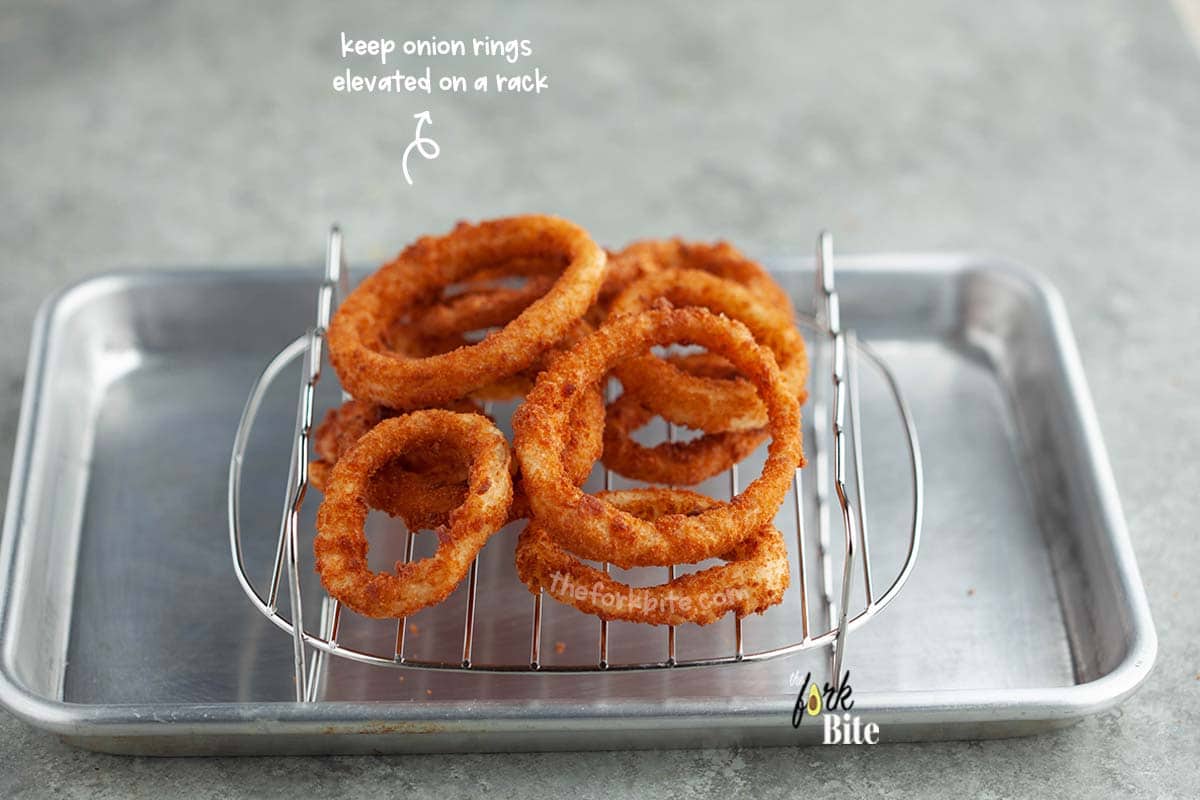 Keep the rings elevated on a rack so the bottom doesn’t get soggy. Put some foil under the rack (not under the food) to catch the grease (optional).