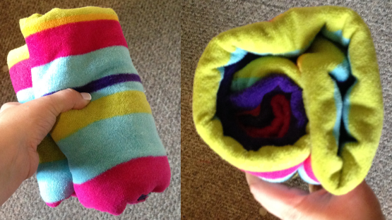 Use a rolled up towel to support the hat when adding heat transfer vinyl.