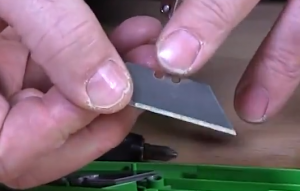 Check any design in the box cutter blade to make sure it is in place.