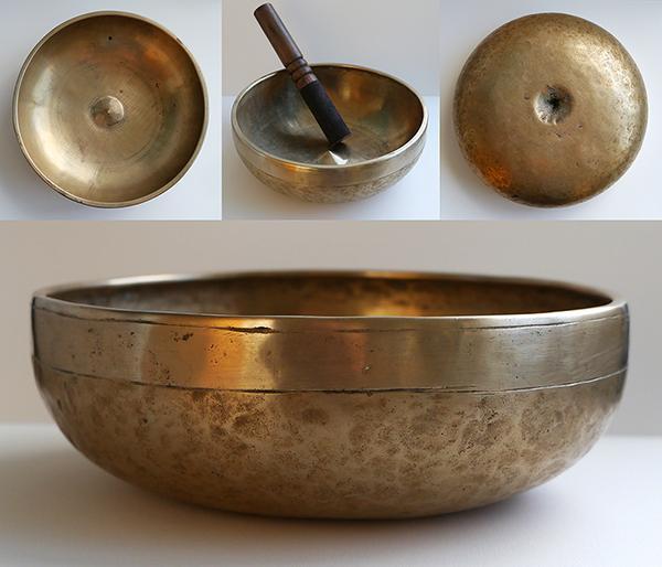 shallow singing bowl different angles protrusion in the center flat bottom
