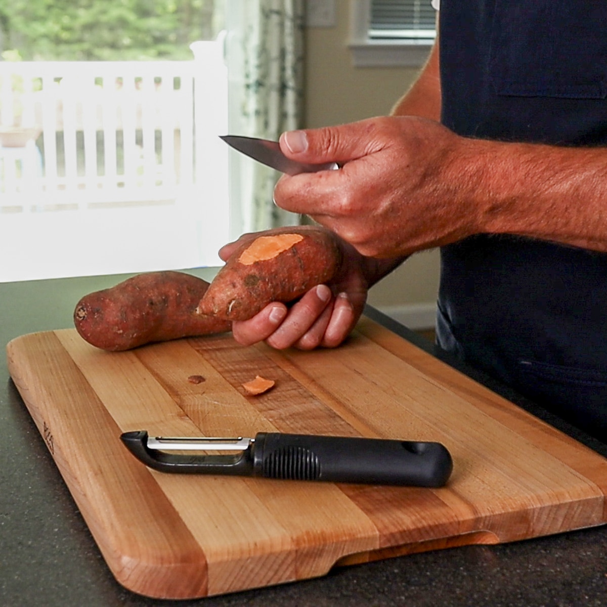 Use a pairing knife and peeler to peel the potatoes.