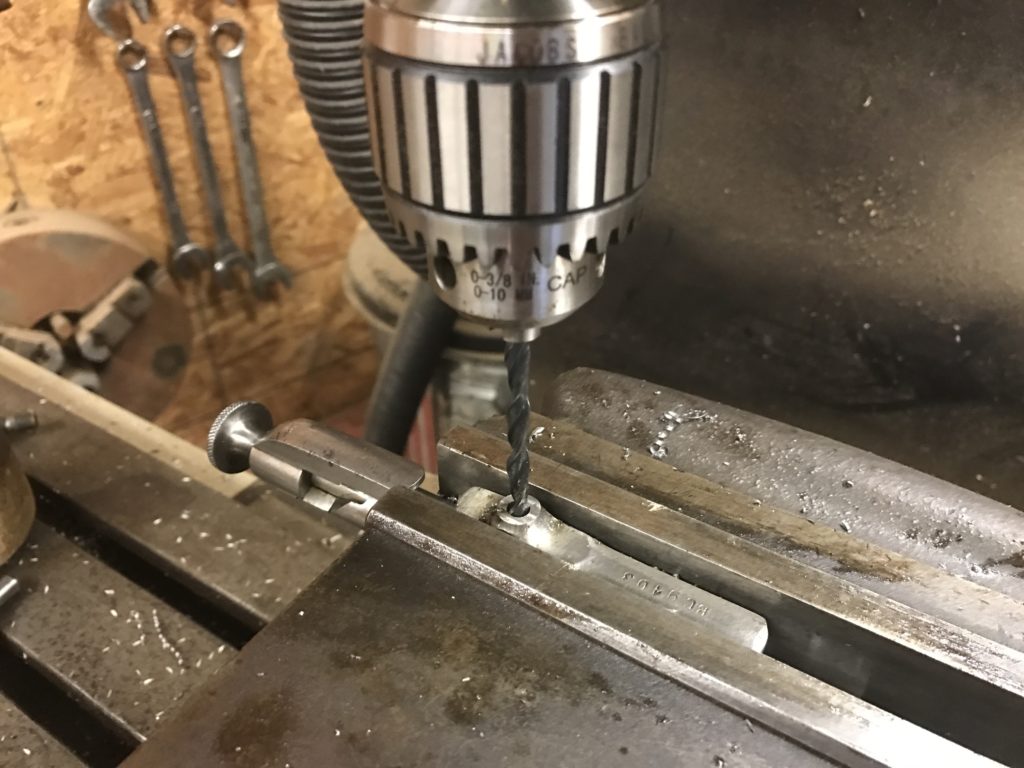 Drill a hole for the new handle.