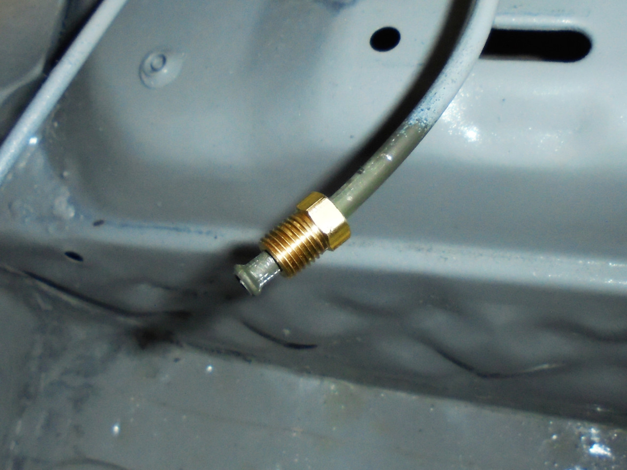 If everything goes as planned, this is your finished product: a tube nut on the brake line next to a double-flared portion of the tubing. All that is left to do now is to tighten it into a fitting and begin to bleed your brakes.