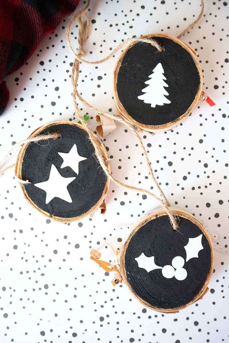 Wooden ornaments with letters with black paint