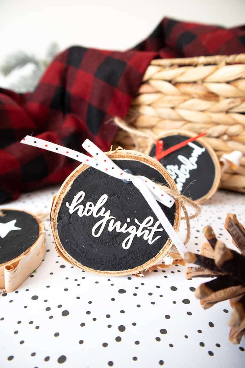 Wooden ornaments with letters with ropes and fabric bows