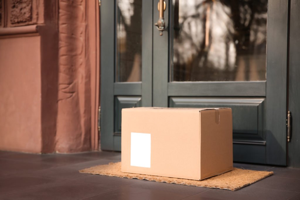 Parcels are delivered on the door mat near the entrance
