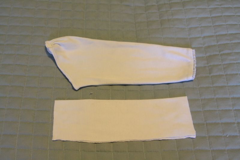 shirt sleeve and rectangular piece of white fabric