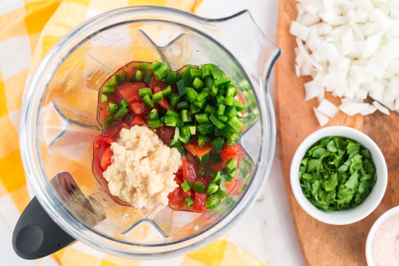 Aerial shot of salsa ingredients in blender