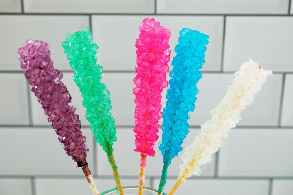 Landscape view of five sticks of rock candy standing up together
