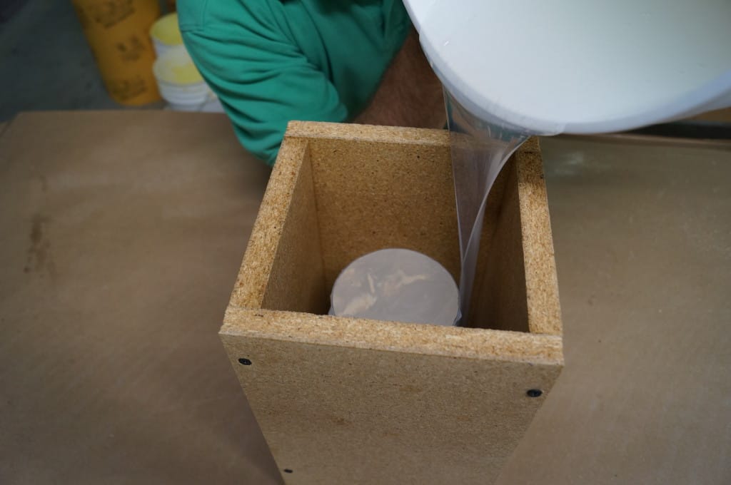 Pour silicone rubber into the mold box