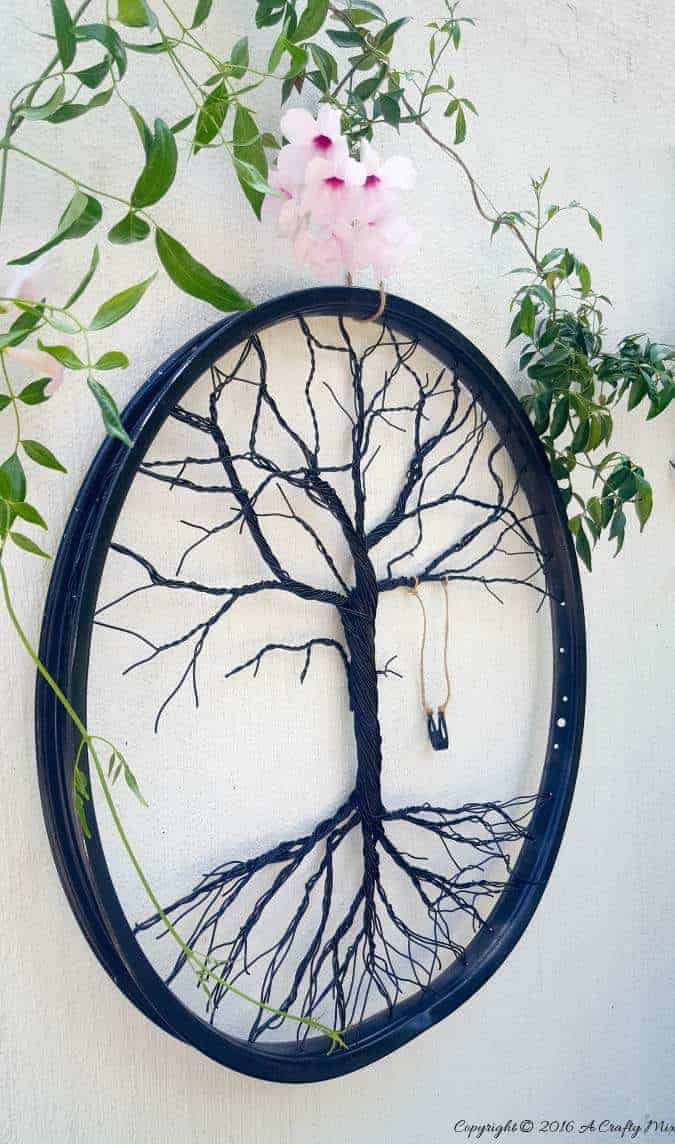 Reuse bicycle wheels and make a tree of life. Full guide on blog
