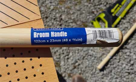 Broom handle to use as rope ladder rungs