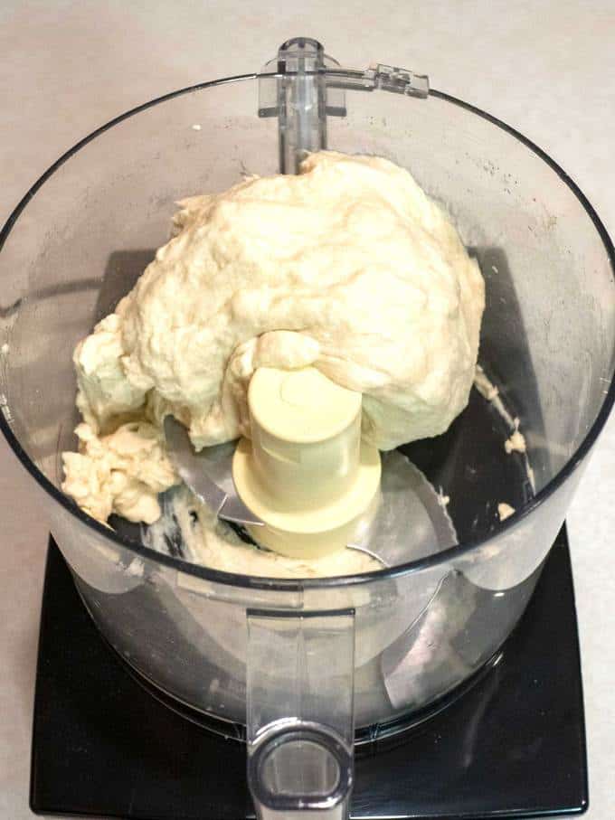 Processed pizza dough in a food blender