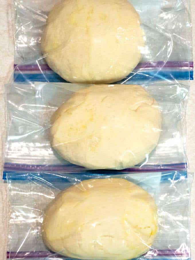 Pizza dough in a ziploc bag in the fridge