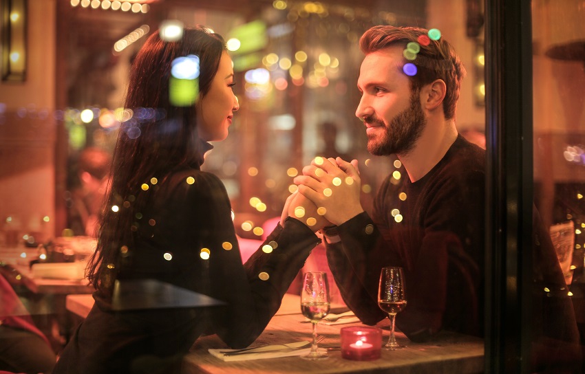 married woman having dinner with a man