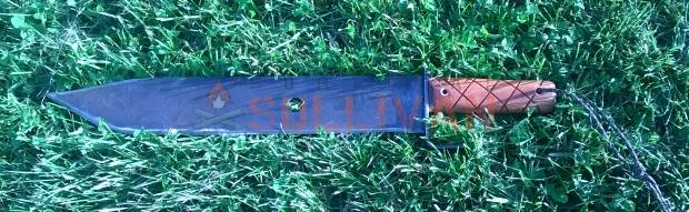 finished machete in grass