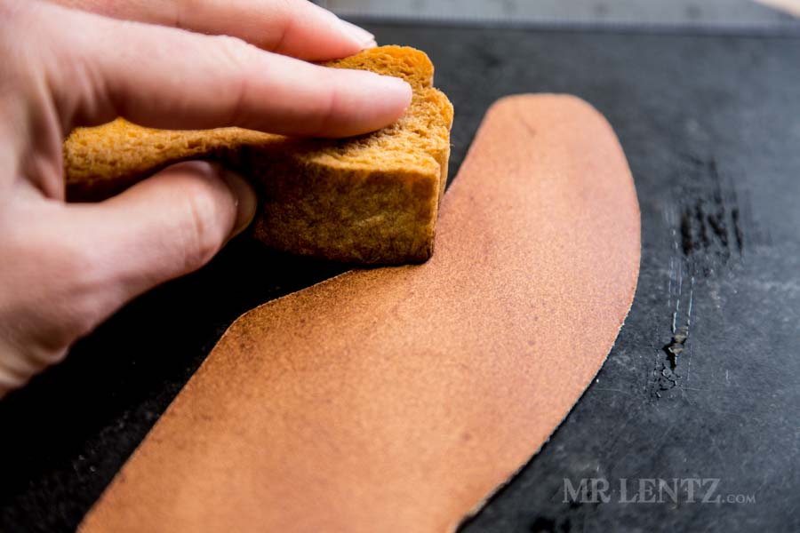 wetting the backside of leather axe sheath