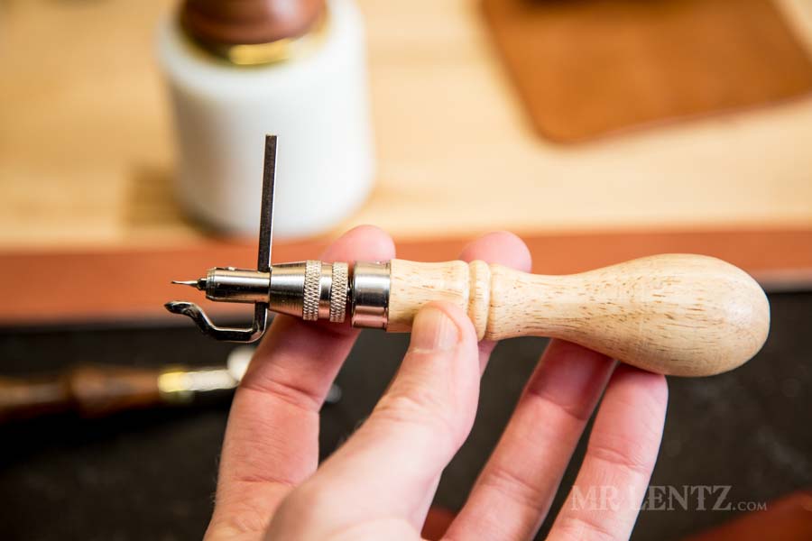 leather creaser used to mark axe sheath