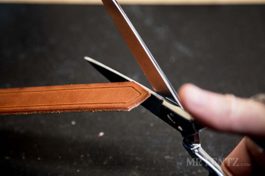 cleaning up the edge on a strap