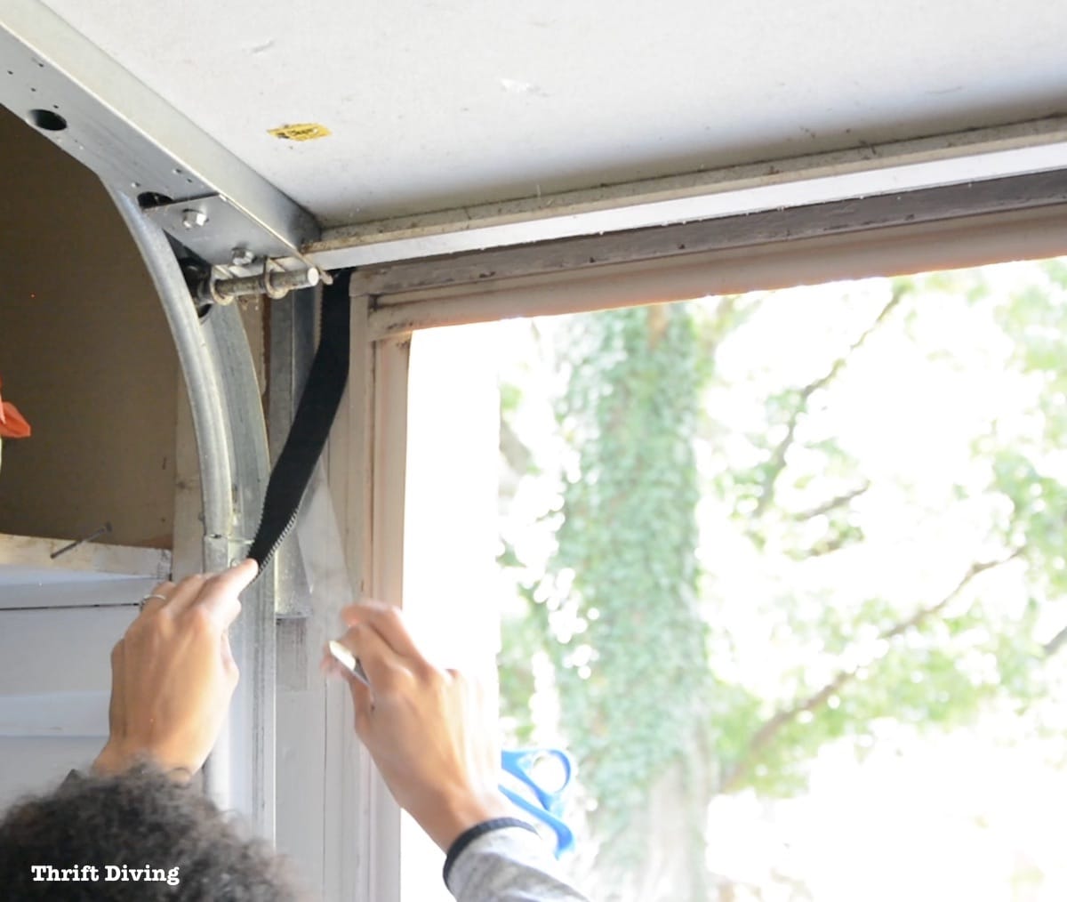 How to Make a Garage Door Screen - Apply the Velcro brand fastener to the perimeter of your garage. Keep out flying insects, such as mosquitos, stink bugs, bees, moths, flies, and gnats. - Thrift Diving