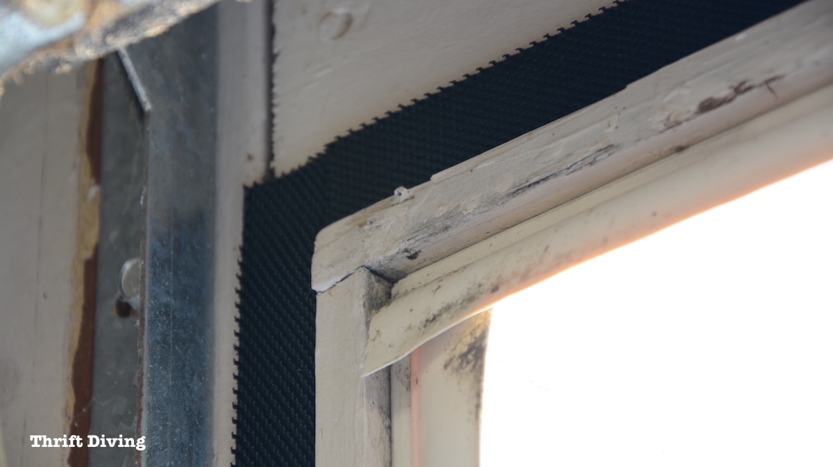 How to Make a Garage Door Screen - Use fasteners around your garage to hang a garage door screen. Keep out flying insects, such as mosquitos, stink bugs, bees, moths, flies, and gnats. - Thrift Diving