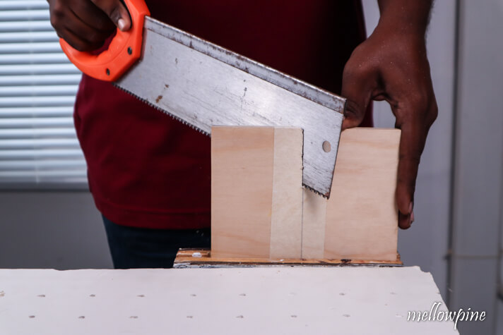 making the cut for french cleat using a handsaw