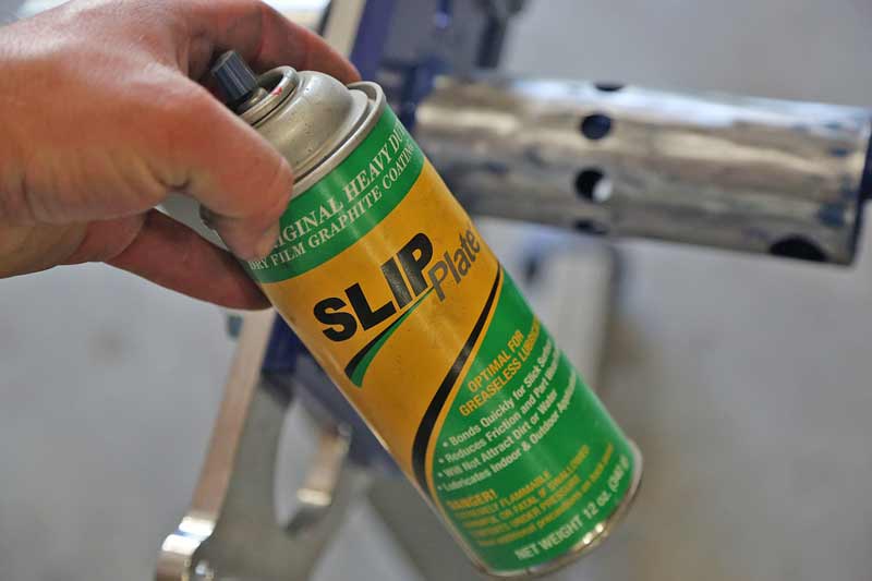 SLIP Plate® is a spray graphite paint that is incredibly effective for reducing friction. We sprayed it on the shaft and let it dry for about 20 minutes.