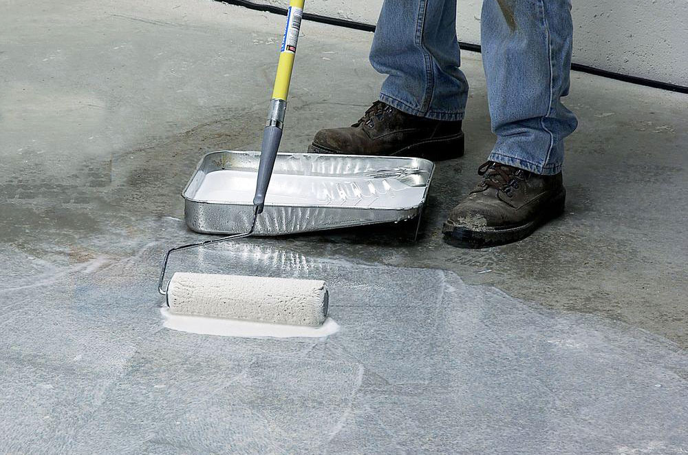 Apply-a-bonding-agent-to-the-concrete How to level a sloped concrete floor (Must read)