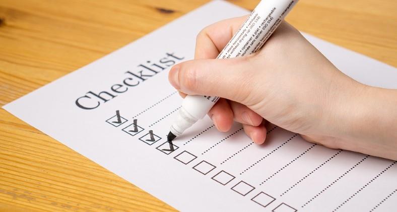 Image of a paper checklist being prepared with a marker