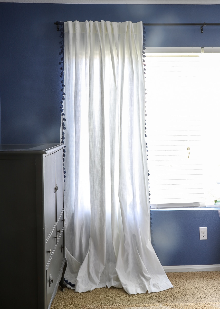 white curtain in front of the window