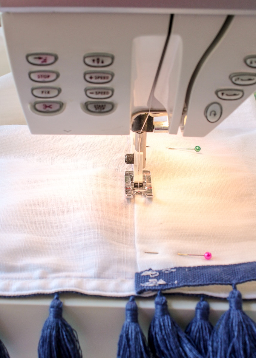 sew the curtain edge with a sewing machine.