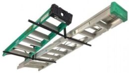 The StoreYourBoard ceiling rack holding two ladders