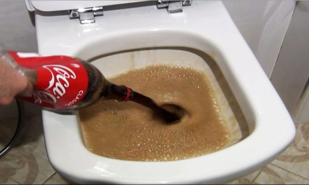 Clean toilets with Cola