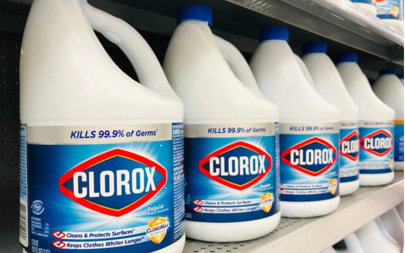 To highlight how to bleach purple hair, several boxes of bleach are placed on the store shelves