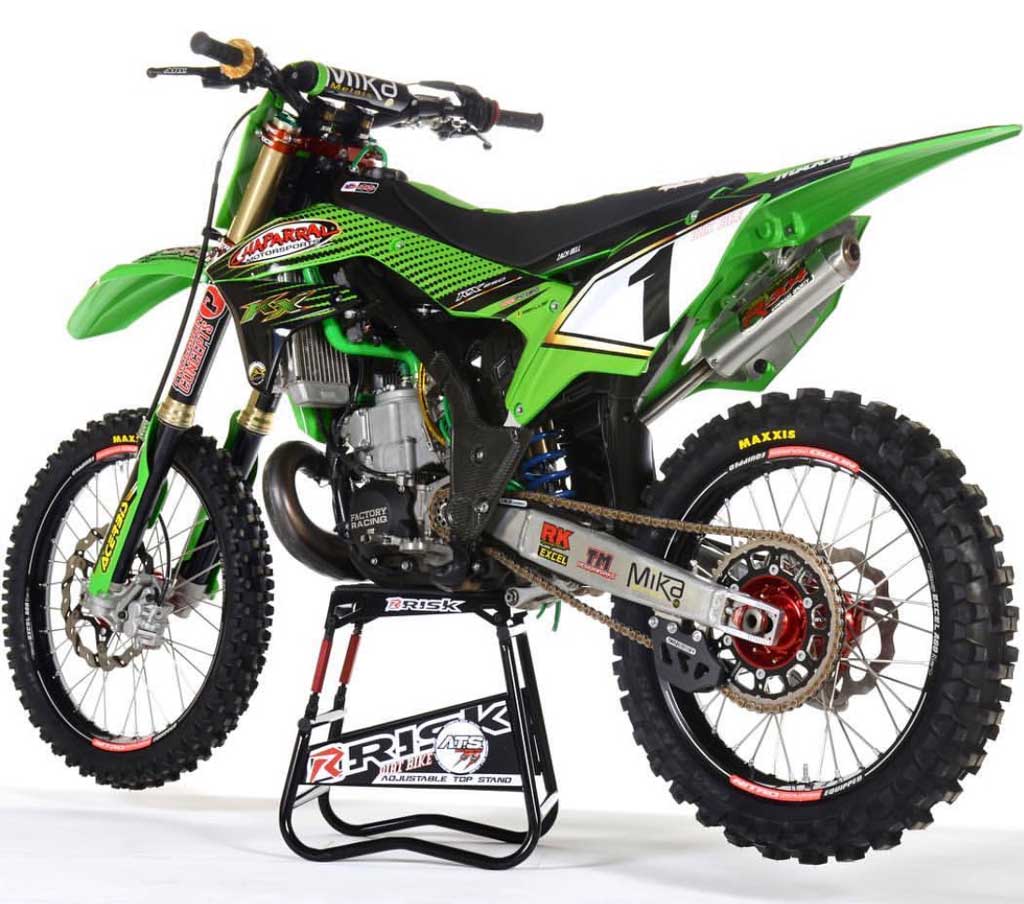 1 kx dirt bike sitting on a risk racing ATS adjustable magnetic stand