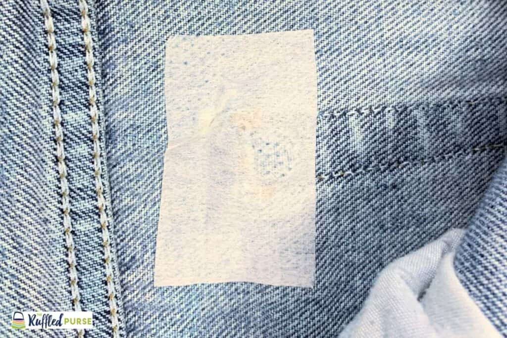 Flowable web applied on the hole in the inside of jeans