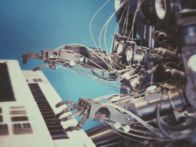 a robot playing a piano