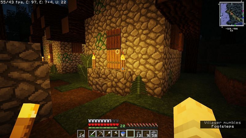 Mossy cobblestone blocks built into a house (Image via Minecraft)